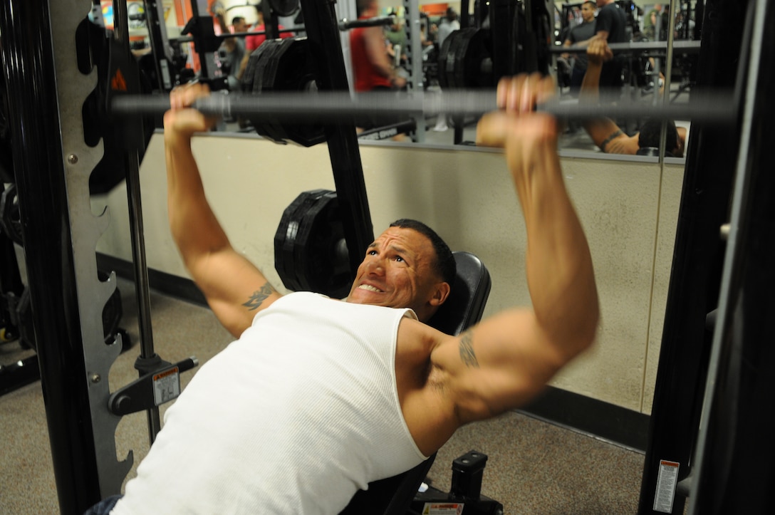 1st Lt. Mycal Anders, body builder and Marine Air Control Squadron 1 air traffic control officer, pushes his body's limits in the gym at the Marine Corps Air Station in Yuma, Ariz., Feb. 28, 2011, as part of his rigorous daily training routine. Anders, an amateur body builder, is preparing himself for a national-level competition in Los Angeles March 26, 2011, weighing in at 198 pounds for the light heavyweight division.