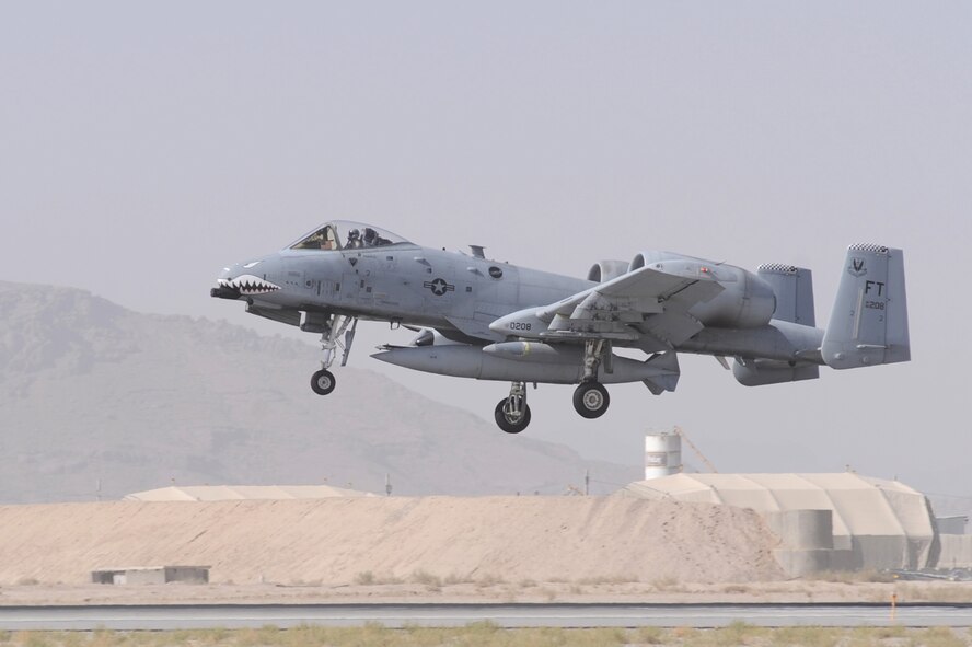 An A-10C Thunderbolt II pilot lands at Kandahar Airfield, Afghanistan Sept. 27, 2010. Throughout 2010, all the flying units under the 451st Air Expeditionary Wing collectively flew nearly 37,000 sorties, supporting more than 1,000 troops in contact on the ground, and saving close to 2,000 people on rescue missions in support of Operation Enduring Freedom. The 75th Expeditionary Fighter Squadron is deployed from Moody Air Force Base, Ga. (U.S. Air Force photo by Tech. Sgt. Chad Chisholm/Released)
