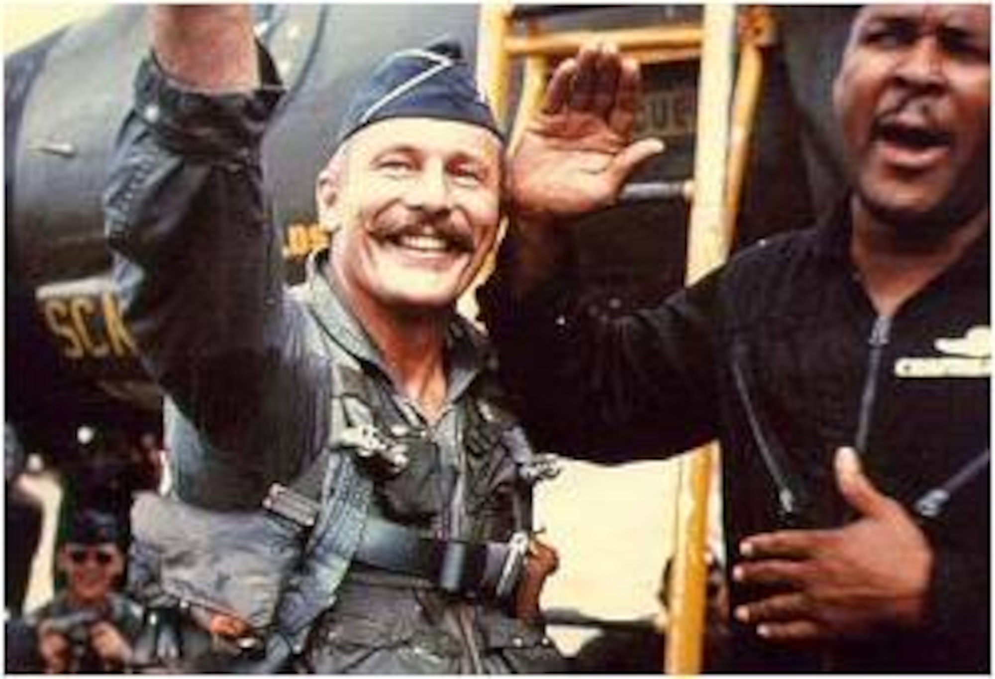 Col. Robin Olds, 8th Tactical Fighter Wing commander, is carried off the airfield after successfully completing Operation Bolo Airmen Jan. 2, 1967.  During Operation Bolo, Colonel Olds dubbed the wing the Wolf Pack because of its aggressive tactics and high degree of teamwork. (U.S. Air Force photo)
