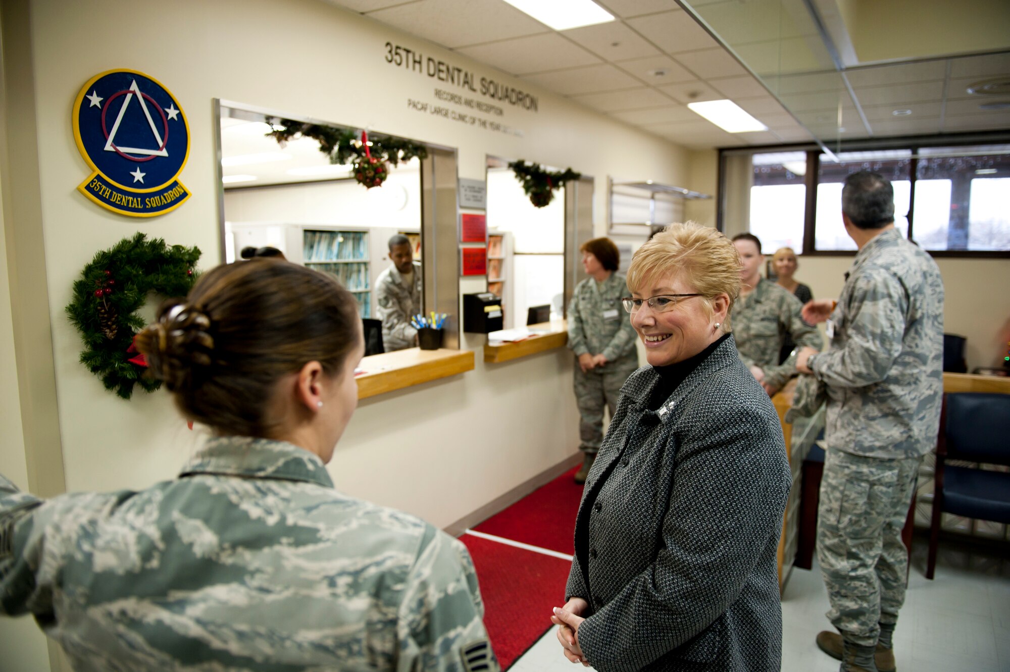 Paula Roy, wife of Chief Master Sgt. of the Air Force James Roy, tours the 35th Dental Squadron during her visit to the 35th Medical Group, Misawa Air Base, Japan, Dec. 29, 2010. Mrs. Roy learned about how the 35th MDG supports the families of Misawa Air Base. (U.S. Air Force photo by Staff Sgt. Samuel Morse/Released)