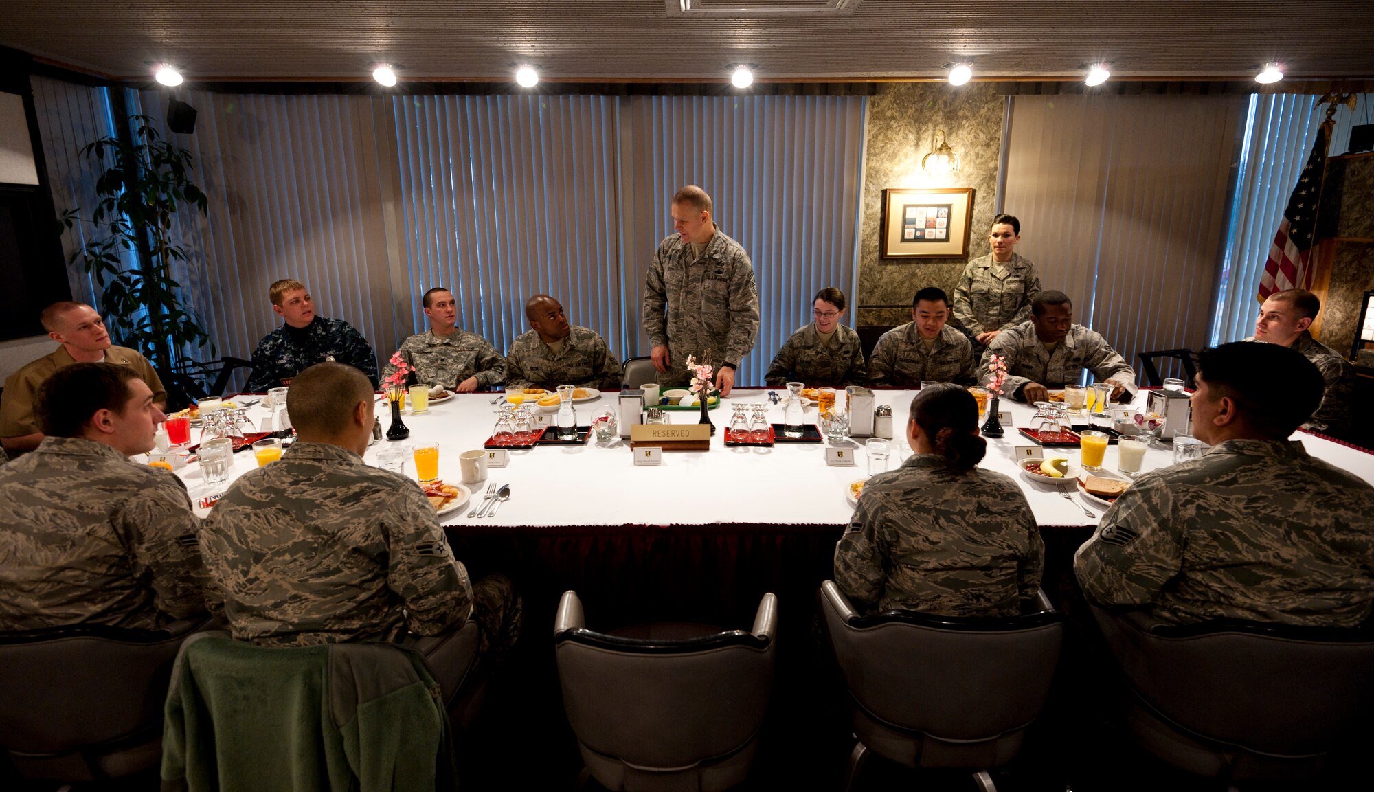 Chief Master Sgt. of the Air Force James Roy addresses enlisted servicemembers stationed at Misawa Air Base, Japan, at the Grissom Dining Facility, Dec. 29, 2010. The Airmen and Sailors invited to the breakfast meeting were given a unique opportunity to talk candidly with him. (U.S. Air Force photo by Staff Sgt. Samuel Morse/Released)