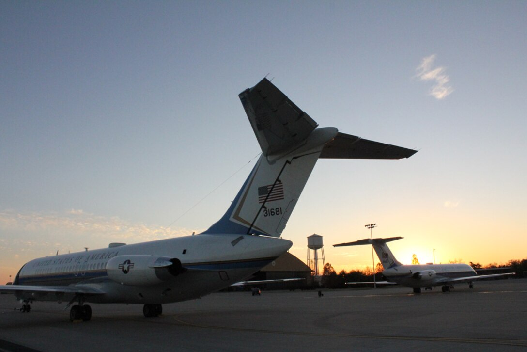 Two C-9C planes of the 932nd Airlift Wing are prepped and positioned by maintenance crews to get ready for a future 2011 mission.  The wing is the only Illinois flying unit for the Air Force Reserve Command.  It performs distinguished visitor missions on both the C-9C and C-40C aircraft.  (U.S. Air Force photo/Maj. Stan Paregien)