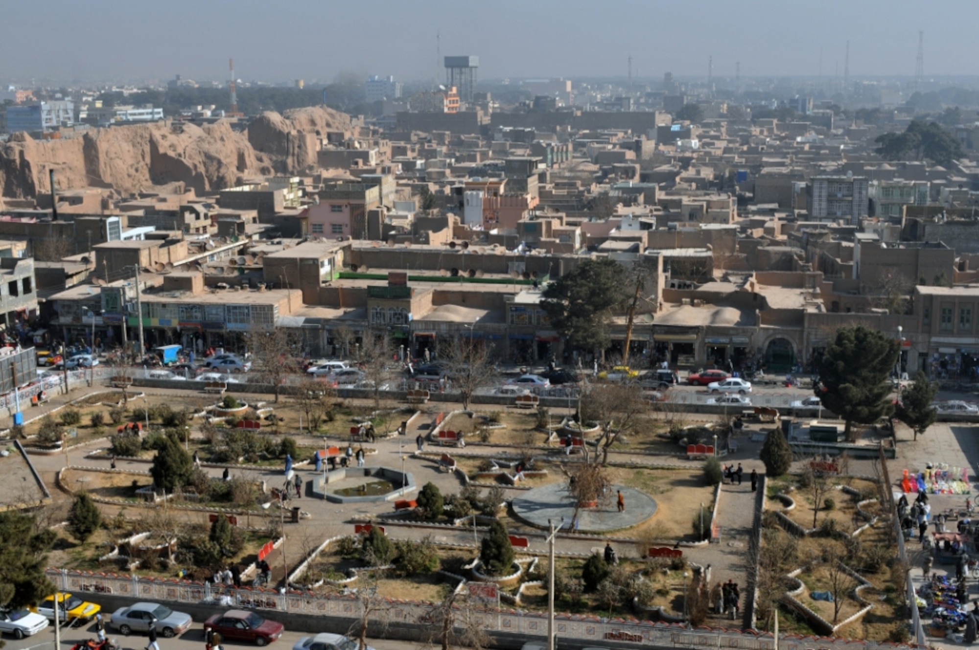 Afghan children play in a Herat City park across from the citadel, a castle believed to have original lineage to a castle built on the same site by Alexander the Great, Dec. 31, 2010. Children are not the only spectacle in the developing city. Working people, business men and venders are also a common site. (U.S. Air Force photo/Tech. Sgt. Kevin Wallace)