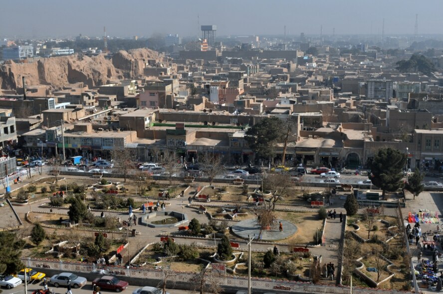 Afghan children play in a Herat City park across from the citadel, a castle believed to have original lineage to a castle built on the same site by Alexander the Great, Dec. 31, 2010. Children are not the only spectacle in the developing city. Working people, business men and venders are also a common site. (U.S. Air Force photo/Tech. Sgt. Kevin Wallace)