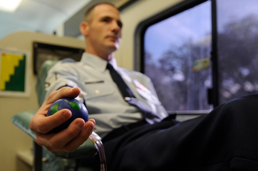 Staff Sgt. Travis Tewes, 2nd Civil Engineer Squadron engineering technician, donates blood to the LifeShare blood organization Jan. 3 at Barksdale Air Force Base, La. The 2 CES hosted the blood drive in order to help increase the local areas supply of units of blood. (U.S. Air Force photo/Senior Airman Allison M. Boehm)(RELEASED) 

