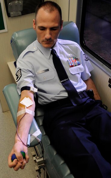 Staff Sgt. Michael Tewes, 2nd Civil Engineer Squadron engineering technician, donates blood to the LifeShare blood organization Jan. 3 at Barksdale Air Force Base, La. The 2 CES hosted the blood drive in order to help increase the local areas supply of units of blood. (U.S. Air Force photo/Senior Airman Allison M. Boehm)(RELEASED)
