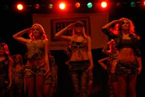 Dallas Cowboys Cheerleaders perform at the base theater during a visit to Osan Air Base, Republic of Korea, Dec. 29. (U.S. Air Force photo/Senior Master Sgt. Paul Holcomb)