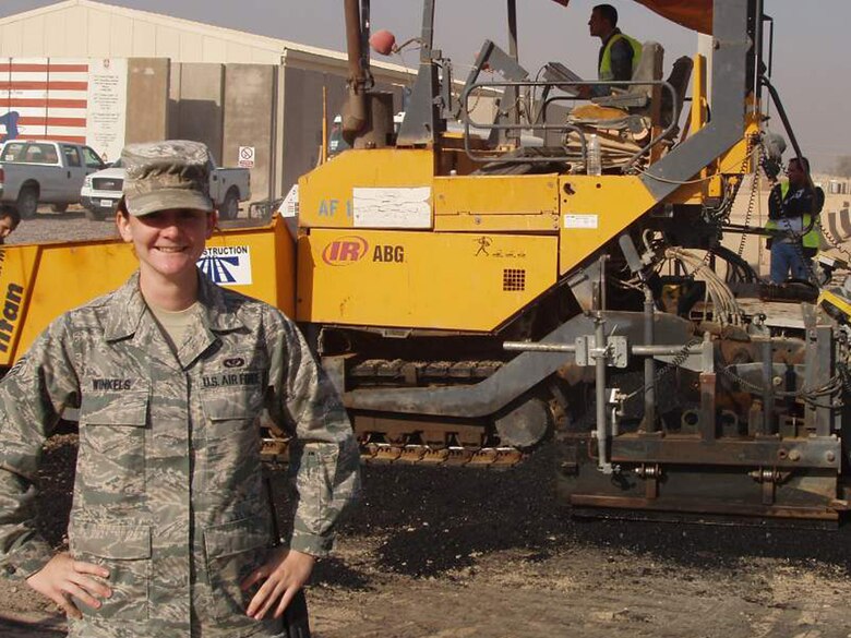 JOINT BASE BALAD, Iraq - Staff Sgt. Jennifer Winkels, 332nd Expeditionary Civil Engineer NCO in charge of construction management during her last deployment.  Sergeant Winkels departed Whiteman June 14 and returned Dec. 26, 2010.  