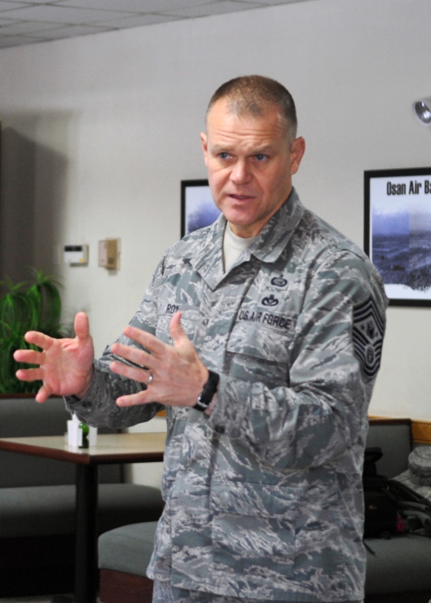 Chief Master Sgt. of the Air Force James Roy addresses 51st Fighter Wing Airmen, Dec. 31, 2010, at Osan Air Base, South Korea. Chief Roy discussed issues regarding enlisted perspective and key issues across the Air Force. (U.S. Air Force photo/Senior Airman Evelyn Chavez)