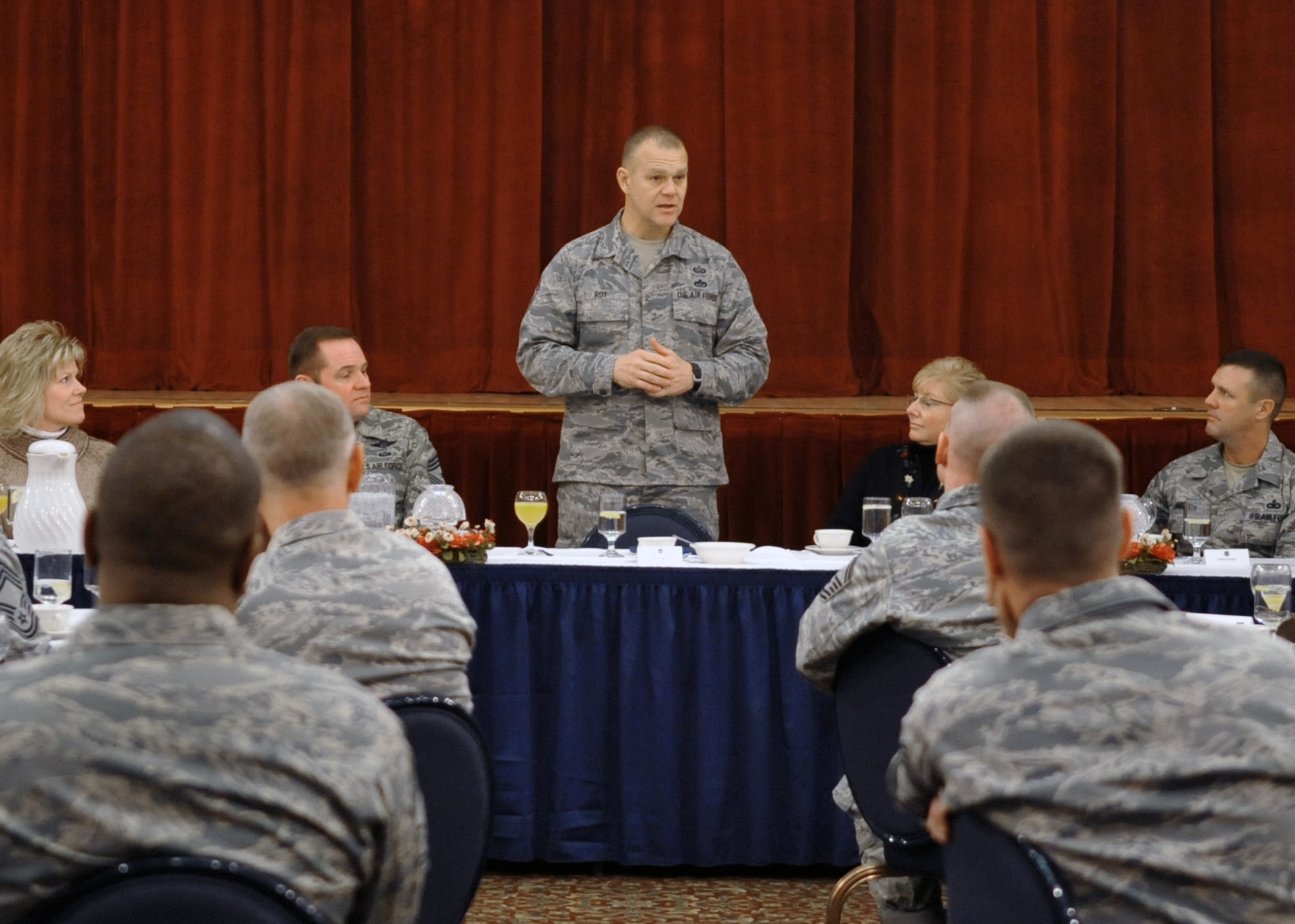 Chief Master Sgt. of the Air Force James Roy addresses chiefs' group members and spouses, Dec. 31, 2010, at Osan Air Base, South Korea. Chief Roy discussed issues regarding enlisted perspective and key issues across the Air Force. (U.S. Air Force photo/Senior Airman Evelyn Chavez)