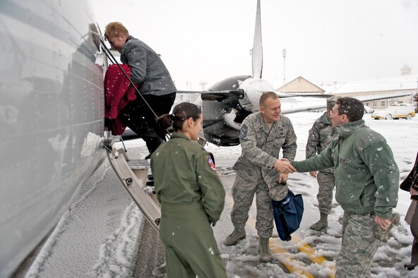Chief Master Sgt. of the Air Force James A. Roy shakes hands with Col. Michael Rothstein Dec. 29, 2010, before boarding a C-12 Huron at Misawa Air Base, Japan. Chief Roy became chief master sergeant of the Air Force in June 2009, and visited Misawa AB to meet and learn about the Airmen of the 35th Fighter Wing. Colonel Rothstein is the 35th Fighter Wing commander. (U.S. Air Force photo/Staff Sgt. Samuel Morse)