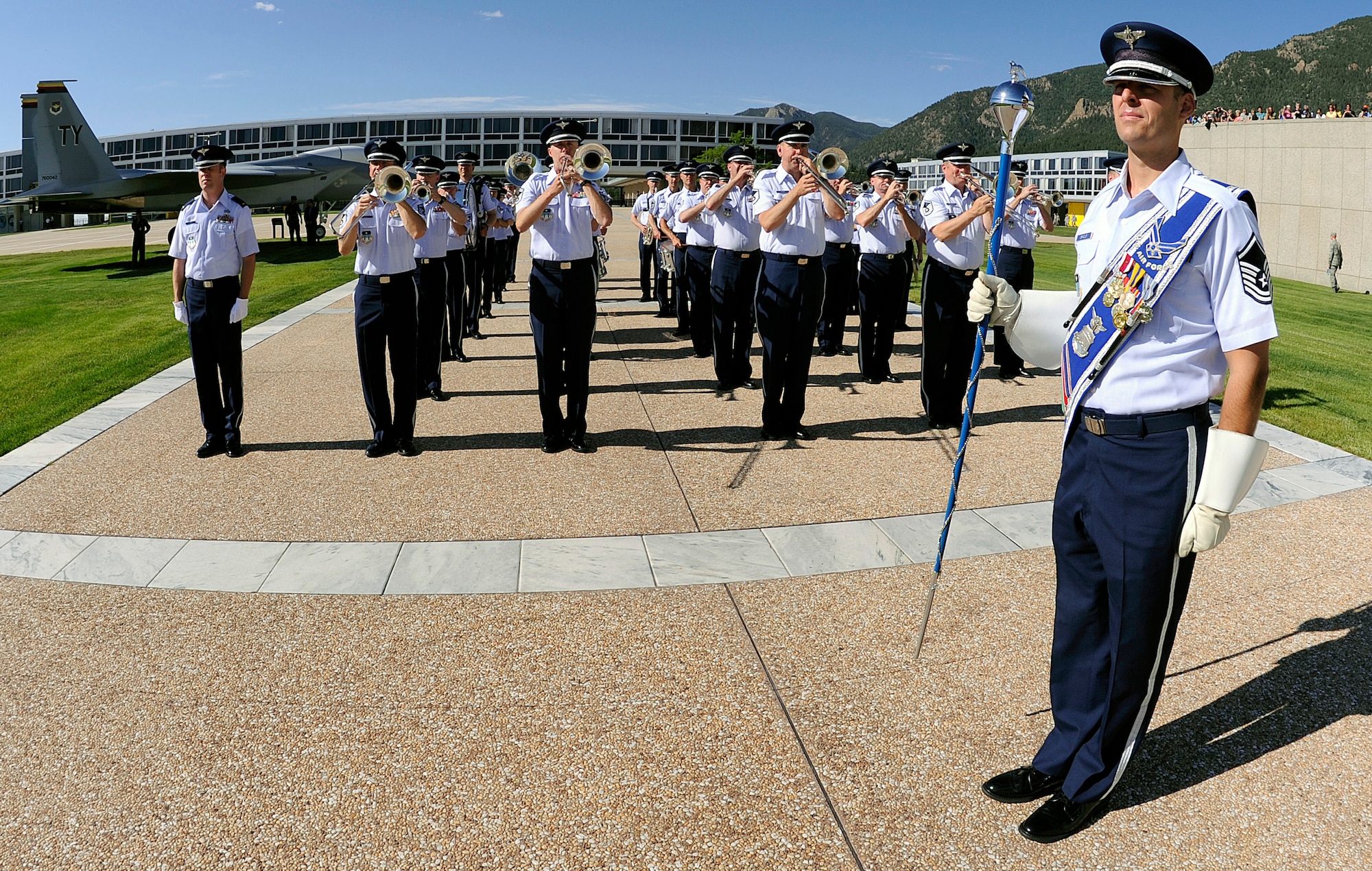 The U.S. Air Force Academy Band performs for the Class of 2014 swearing-in ceremony at the Academy in Colorado Springs, Colo., June 25, 2010. The Air Force Academy band, one of 12 active-duty Air Force bands around the world, is stationed at nearby Peterson Air Force Base. (U.S. Air Force photo/Mike Kaplan)