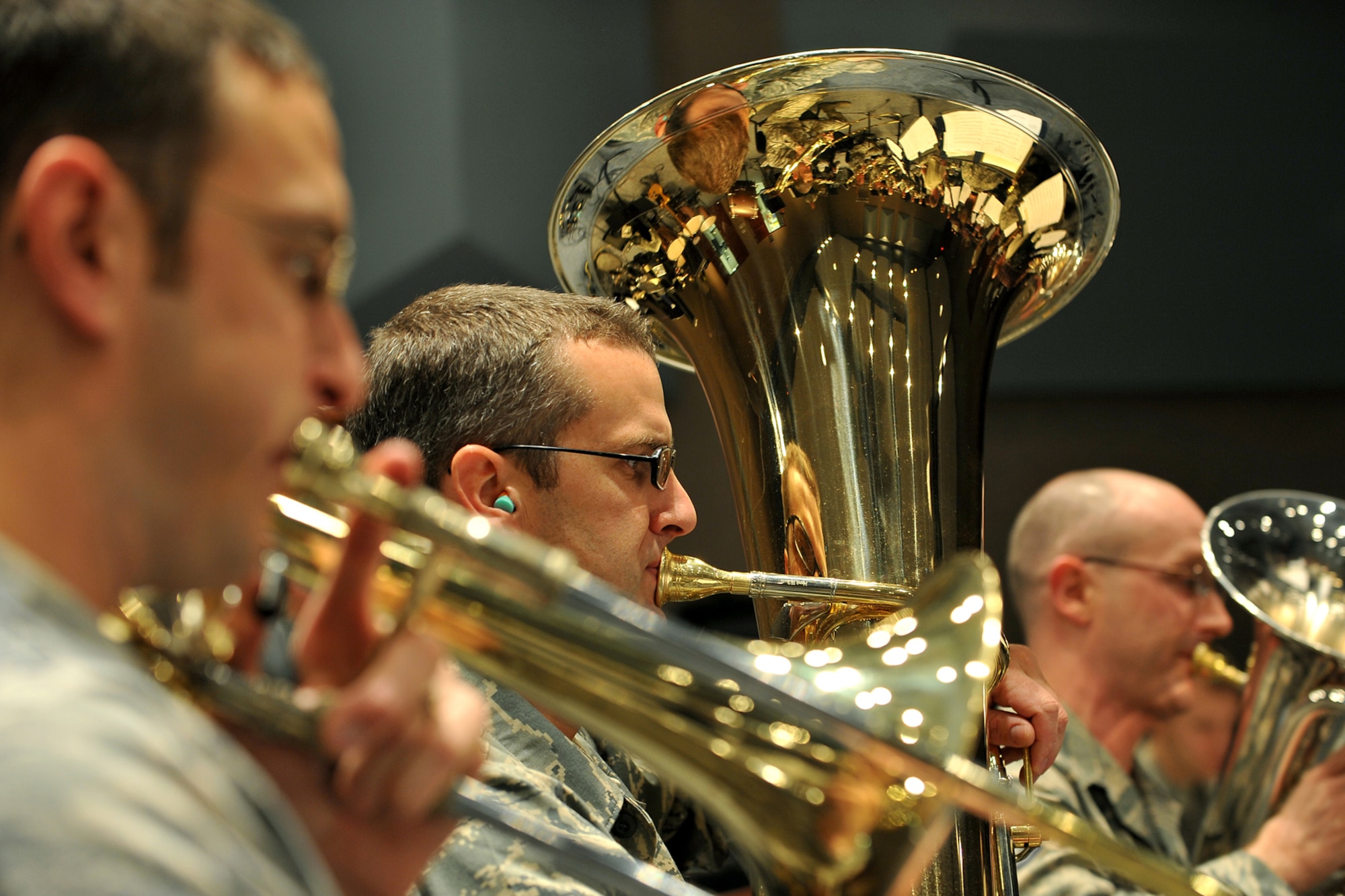 Staff Sgts. Matt Erickson and Mark Barnette, both with the Heartland of America Band, rehearse Nov. 24, 2009, at Offutt Air Force Base, Neb. The band performs a broad range of musical styles ranging from classic to contemporary, jazz to country and pop to rock. The various components of the band perform tour extensively throughout a 680,000 square mile, eight-state area.  (U.S. Air Force photo/Charles Haymond)