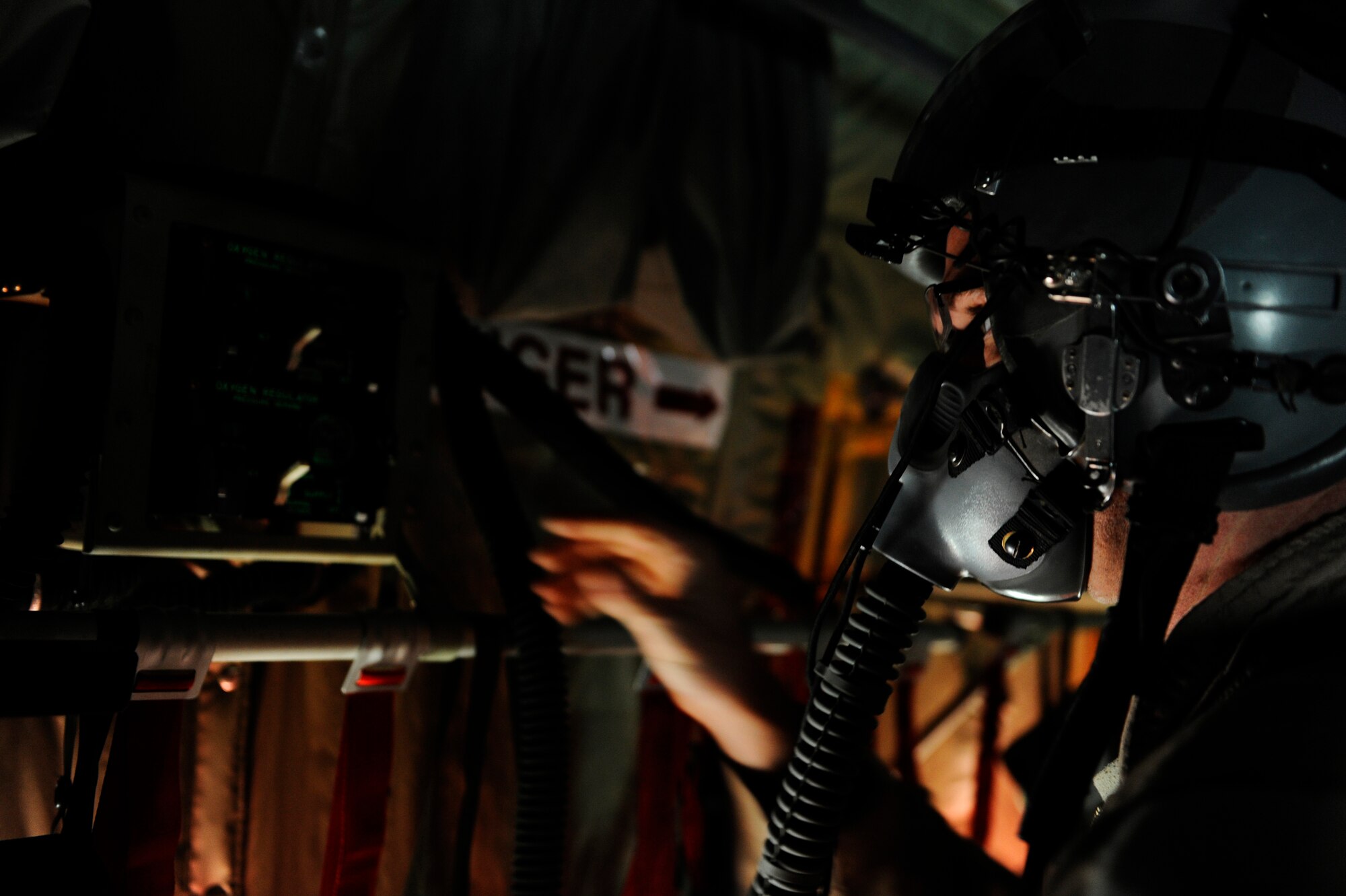 U.S. Air Force Tech. Sgt. Brian Digsby, 772nd Expeditionary Airlift Squadron, tests an oxygen regulator aboard a C-130J Hercules before an air drop mission in support of Operation Enduring Freedom at Kandahar Airfield, Afghanistan, Dec. 29, 2010.  C-130 aircrews ensure that troops on the ground have adequate supplies to complete their mission by air dropping their supplies.  (U.S. Air Force Photo/Staff Sgt. Eric Harris) (RELEASED)