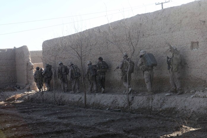 U.S. Marines assigned to 3rd Battalion, 5th Marines, Regimental Combat Team 2 conduct a security patrol in Sangin valley, Helmand province, Afghanistan, Jan. 3, 2011. The Marines conducted counterinsurgency operations in support of the International Security Assistance Force in order to decrease insurgent activity and gain the support of the Afghan residents.