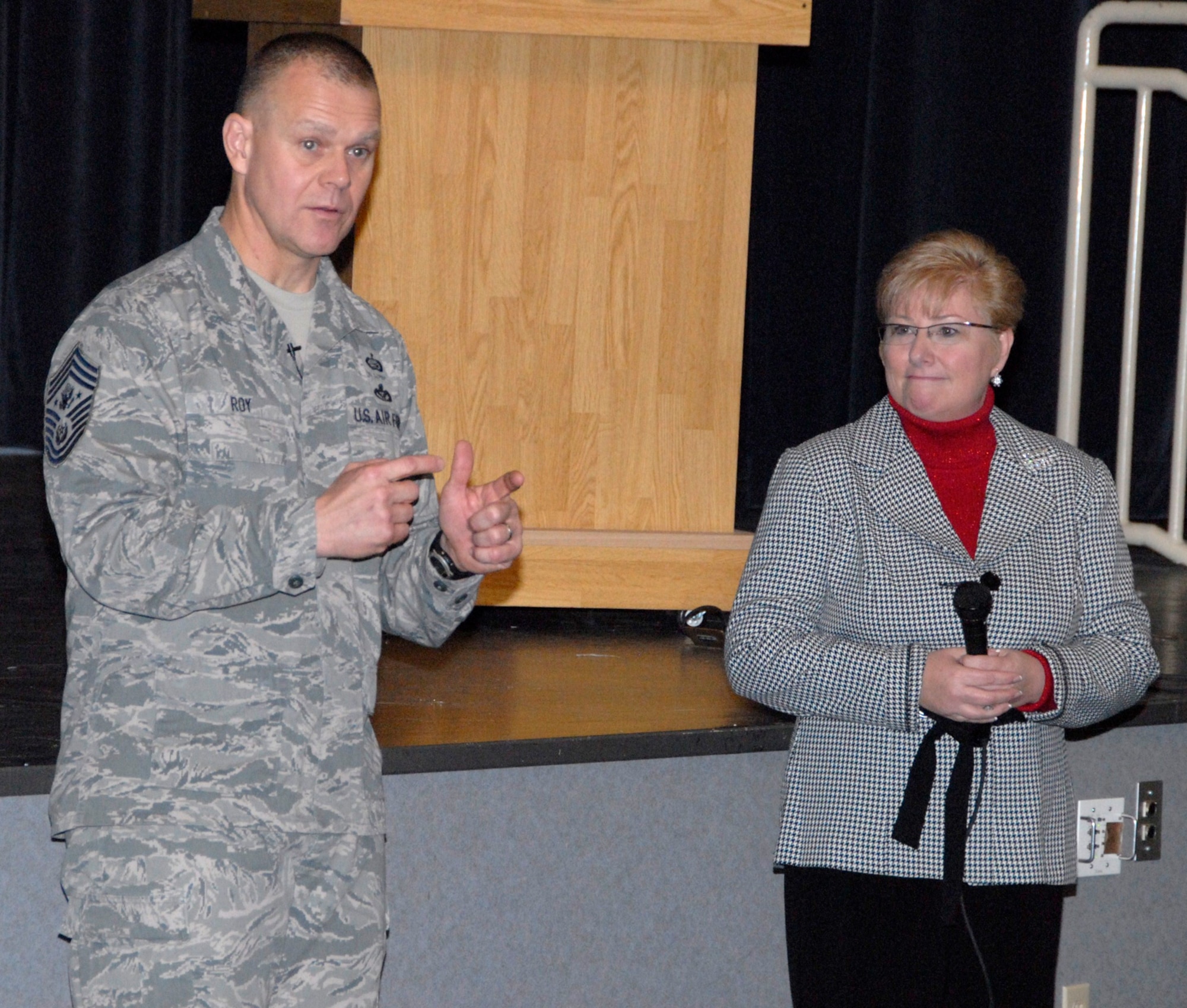 Chief Master Sgt. of the Air Force James A. Roy and his wife, Paula, answer questions during an enlisted call Dec. 30, 2010, at Kunsan Air Base, South Korea. Chief and Mrs. Roy visited Kunsan AB Dec. 29 and 30, during their year-end tour of Pacific Air Forces bases. (U.S. Air Force photo/Staff Sgt. Amanda Savannah)