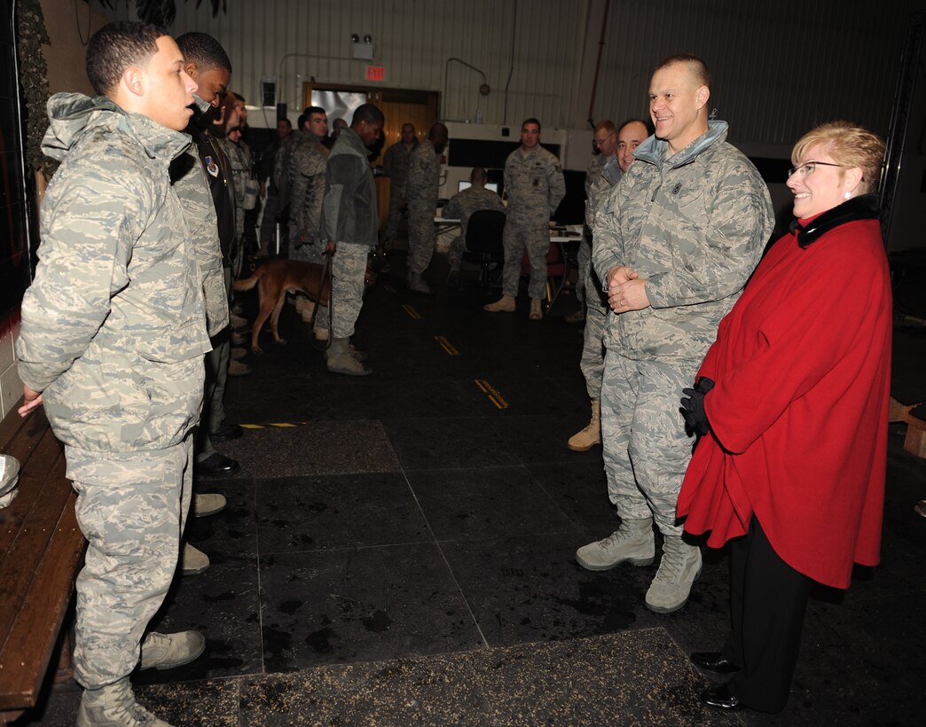 Airman First Class Zachary Tealer gives a mission briefing to Chief Master Sgt. of the Air Force James A. Roy and his wife, Paula, Dec. 30, 2010, during their visit to Kunsan Air Base, South Korea. Chief and Mrs. Roy visited Kunsan AB Dec. 29 and 30, during their year-end tour of Pacific Air Forces bases. Airman Tealer is an 8th Security Forces Squadron responder. (U.S. Air Force photo/Senior Airman Ciara Wymbs)