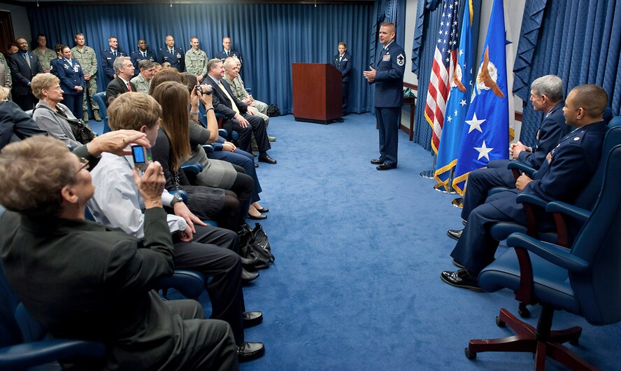 Senior Master Sgt. Anthony Smith speaks to the audience after receiving the 2010 General Lew Allen Jr. Award during a ceremony Jan. 4, 2011, in the Pentagon. The award is presented annually to an officer and to an NCO working in aircraft, munitions or missile maintenance and directly involved in aircraft sortie generation. The award's namesake served as the Air Force Chief of Staff from 1978 to 1982. Sergeant Smith was honored for his work as the 57th Aircraft Maintenance Squadron Viper Aircraft Maintenance Unit superintendent at Nellis Air Force Base, Nev. (U.S. Air Force photo/Jim Varhegyi)