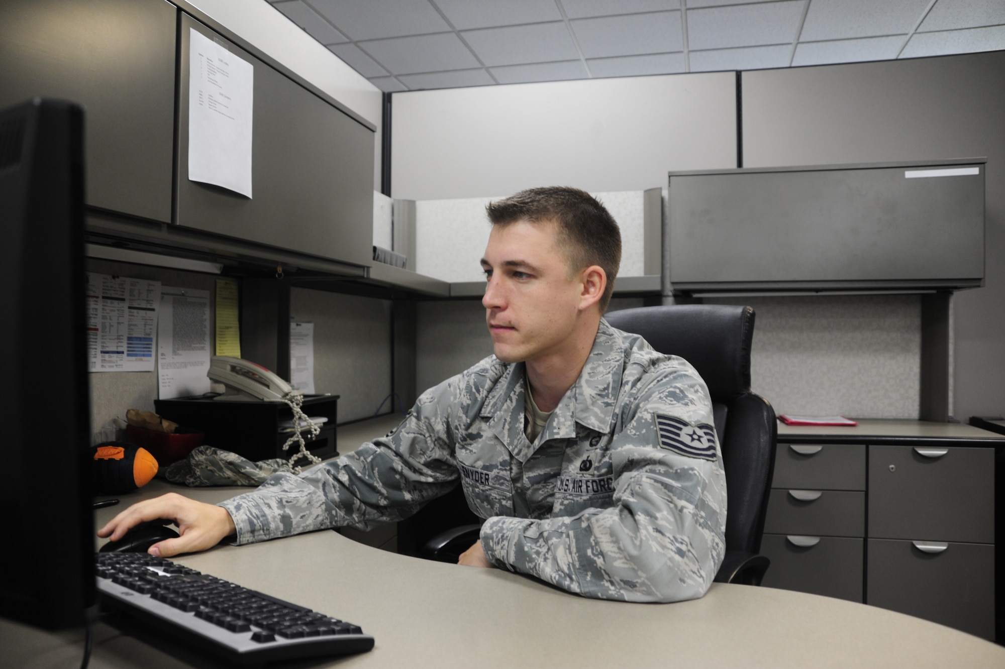 Tech. Sgt. Patrick Snyder, 62nd Aircraft Maintenance Squadron unit training manger, looks through electronic training records recently at McChord Field, Joint Base Lewis-McChord, Wash. He was recently named Air Mobility Command's Training Manager of the Year for 2010. (U.S. Air Force photo/Airman Leah Young)