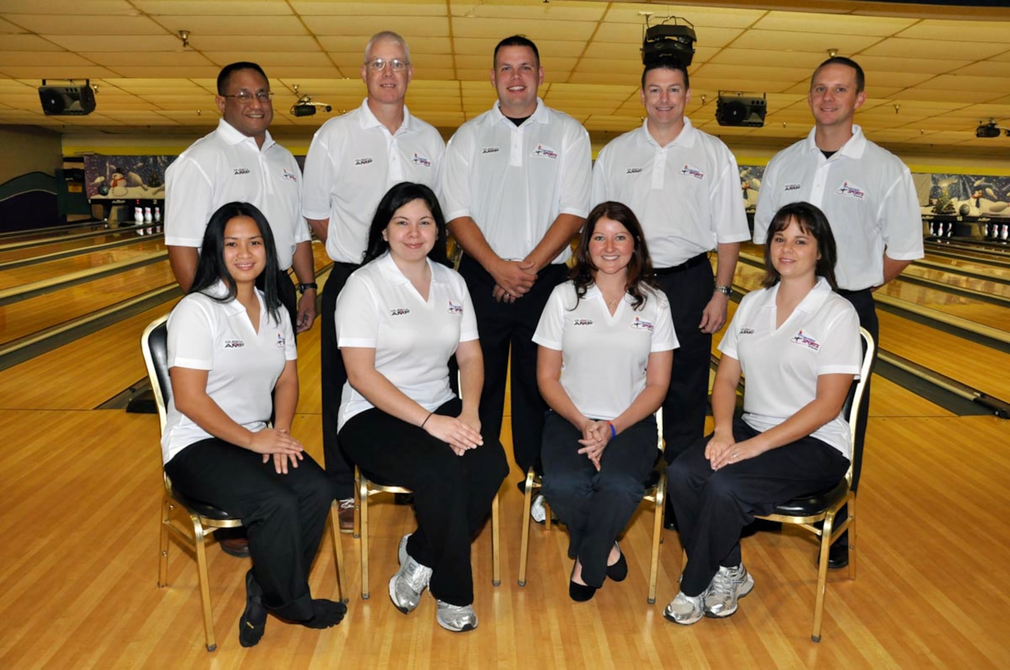 Members of the Air Force bowling team include (front row left to right):  Staff Sgt. Ireland Strickland, Staff Sgt. Natasha Sanchez, Tech. Sgt. Kristin Odekirk and Staff Sgt. Lisa Gibson; (back row left to right): Coach Steve Barinque, Chief Master Sgt. Scott Thomsen, Tech. Sgt. Joshua Chambliss, Tech. Sgt. David Tolson and 1st Lt. Jeffrey Robertson.  (U.S. Air Force photo)