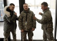 MINOT AIR FORCE BASE, N.D. --  Staff Sgt. Michael Burnett, 5th Civil Engineering Squadron explosives ordinance disposal journeyman, was promoted to Technical Sgt. during a Stripes for Exceptional Performers (STEP) ceremony here, Dec. 23.  STEP promotions reward outstanding and deserving Airman who work hard and perform superbly. (U.S. Air Force photo/Staff Sgt. Keith Ballard)