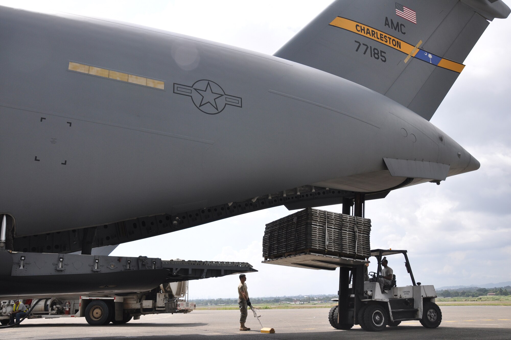Aerial porters from the 81st Aerial Port Squadron, Joint Base Charleston, S.C., load empty pallets aboard a C-17 Globemaster III before leaving Panama during a training and humanitarian mission to Haiti and Grenada Dec. 30, 2010. (U.S. Air Force photo/Senior Airman Robert Pilch)