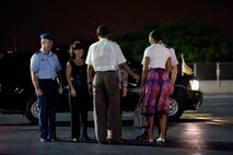 President Barack Obama and his wife Michelle talk with Gen. Gary North, Pacific Air Forces commander, and his wife Shelley, and  Col. Sam Barrett, 15th Wing commander, and his wife Kelly,  as the President and first family prepare to depart the 15th Wing at Joint Base Pearl-Harbor Hickam, Hawaii, Jan. 3. The President arrived on Dec. 22, and Air Force One remained parked at the 15th Wing while the President vacationed in Hawaii with his family. (U.S. Air Force photo/Staff Sgt. Nathan Allen)