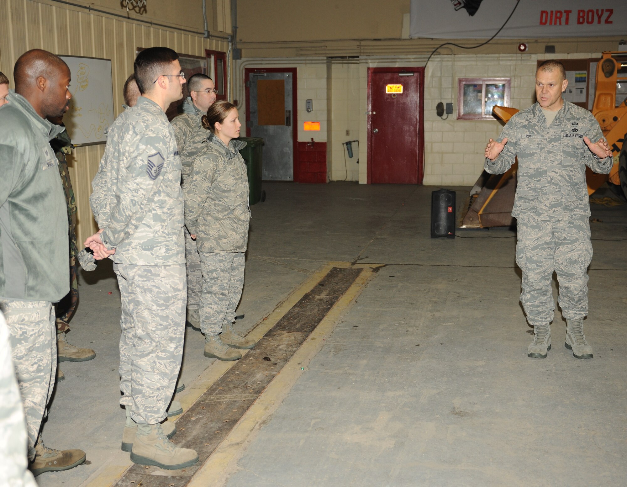 KUNSAN AIR BASE, Republic of Korea -- Chief Master Sgt. of the Air Force James Roy speaks to Airmen from the 8th Civil Engineer Squadron Dec. 30 during his visit to the Wolf Pack. Chief Roy and his wife, Paula, visited the Wolf Pack Dec. 29 and 30 during their year-end tour of Pacific Air Forces bases. (U.S. Air Force photo/Senior Airman Ciara Wymbs)