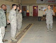 KUNSAN AIR BASE, Republic of Korea -- Chief Master Sgt. of the Air Force James Roy speaks to Airmen from the 8th Civil Engineer Squadron Dec. 30 during his visit to the Wolf Pack. Chief Roy and his wife, Paula, visited the Wolf Pack Dec. 29 and 30 during their year-end tour of Pacific Air Forces bases. (U.S. Air Force photo/Senior Airman Ciara Wymbs)