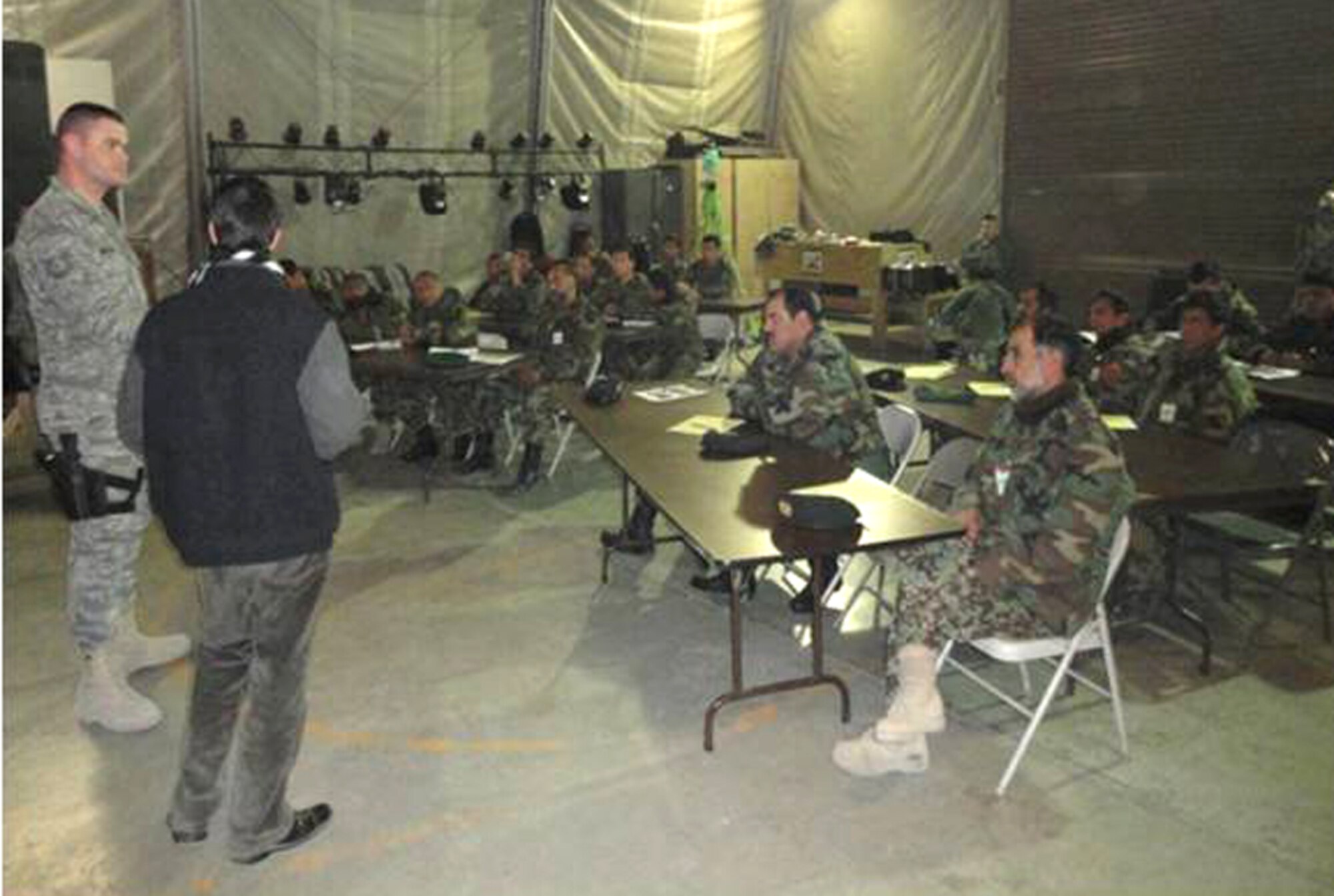 Tech. Sgt. Jarrod Williford teaches crime scene training to the 21 members of the Afghan National Army Criminal Investigation Command Jan. 3, 2011, at Camp Eggers, Afghanistan. Sergeant Williford is with the Camp Eggers Provost Marshal's Office. (U.S. Air Force photo) 