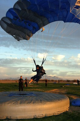 Cadet 1st Class Josh LeMair, a member of the Air Force Wings of Blue Parachute Competition Team, nails a classic accuracy jump in the U.S. Parachute Association's National Collegiate Parachuting Championships, which were held in Eloy, Ariz., from Dec. 30, 2010, to Jan. 1, 2011. Wings of Blue teams won gold in four-way open formation skydiving, two-way vertical formation skydiving, intermediate and masters sport accuracy, intermediate and masters classic accuracy and team classic accuracy. (Courtesy photo/Niklas Daniel)