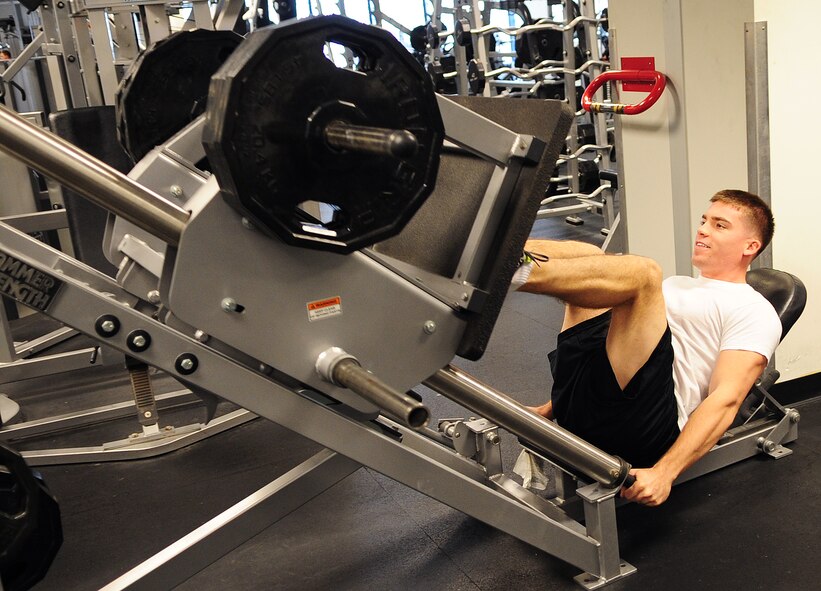 MOODY AIR FORCE BASE, Ga. -- Cadet Robert Hudspeth, Valdosta State University Air Force ROTC Det. 172, uses the leg press machine to work out his quadriceps, hamstrings and gluteus maximus muscles Jan. 5.  In addition to working out, healthy eating is an important part of weight loss. (U.S. Air Force photo/Senior Airman Stephanie Mancha)(RELEASED)