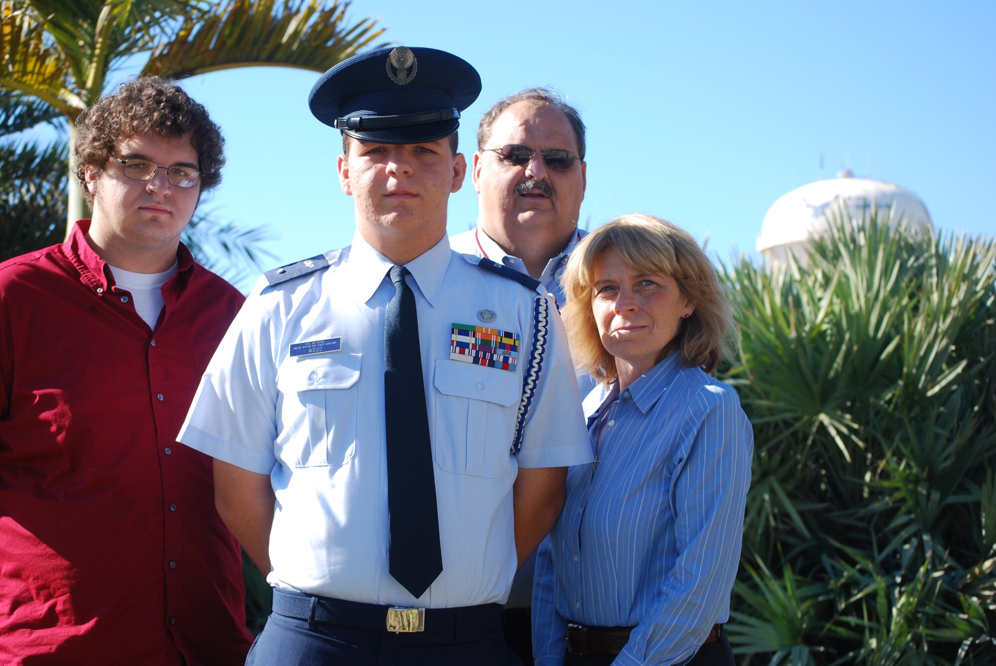 Cadet / 2nd Lt. Jeffrey Wood gets lots of love and support from his family, to include (left to right) his brother Jacob (a student at USF in Tampa), his father, Toni, and his mother, Kathi.
