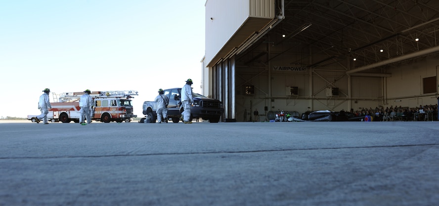 MOODY AIR FORCE BASE, Ga.-- Emergency response personnel respond to an accident demonstration hosted by the 23rd Wing Safety office during the Wing Safety Day brief Jan. 3. The scenario included a drunk driver who ran off the road and  flipped a vehicle with three passengers; one survivor was pulled from the wreckage. (U.S. Air Force photo/Airman 1st Class Benjamin Wiseman)(RELEASED)