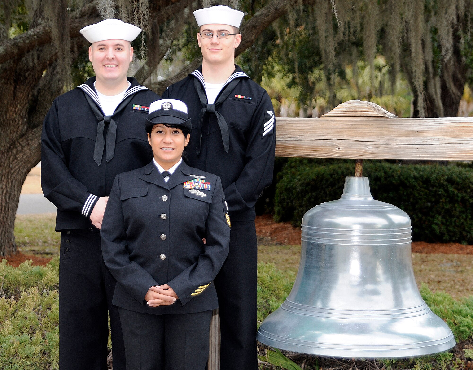 Congratulations to Naval Support Activity first quarter Fiscal Year 2011 Sailor of the Quarter, Culinary Specialist 1st Class Jinnett Santos (front), Junior Sailor of the Quarter, Machinist's Mate 2nd Class Nicholas Miller (left) and Blue Jacket of the Quarter, Information Systems Technician Seaman Brian Latour. (Photo by Mass Communications Specialist First Class Jennifer R. Hudson)