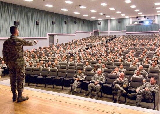 Chief Master Sgt. Eric R. Jaren, Air Force Materiel Command command chief, addresses Edwards enlisted personnel in the Base Theater, Dec. 15. Chief Jaren and his wife toured the base Dec. 13 to Dec. 15. (Air Force photo by Edward Cannon)