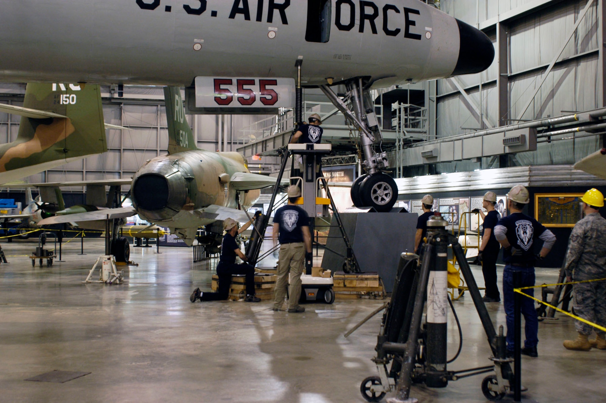 DAYTON, Ohio (01/2011) -- Restoration crews move the EC-121D onto pylons in the Southeast Asia War Gallery at the National Museum of the U.S. Air Force. (U.S. Air Force photo)