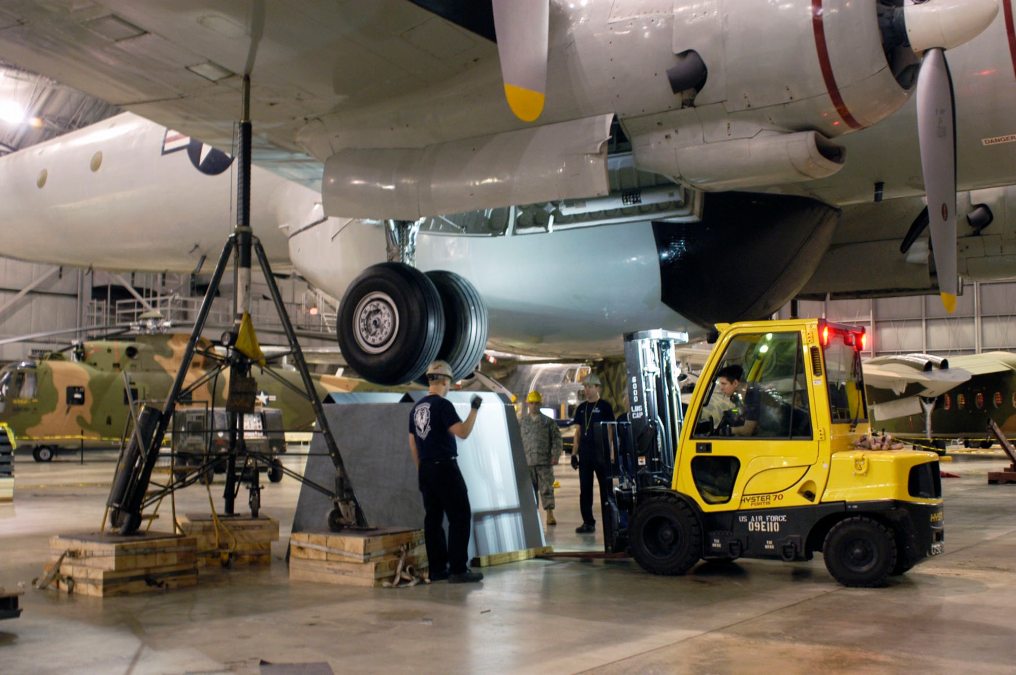 DAYTON, Ohio (01/2011) -- Restoration crews move the EC-121D onto pylons in the Southeast Asia War Gallery at the National Museum of the U.S. Air Force. (U.S. Air Force photo)