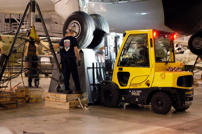 DAYTON, Ohio (01/2011) -- Restoration crews move the EC-121D onto pylons in the Southeast Asia War Gallery at the National Museum of the U.S. Air Force. (U.S. Air Force photo)