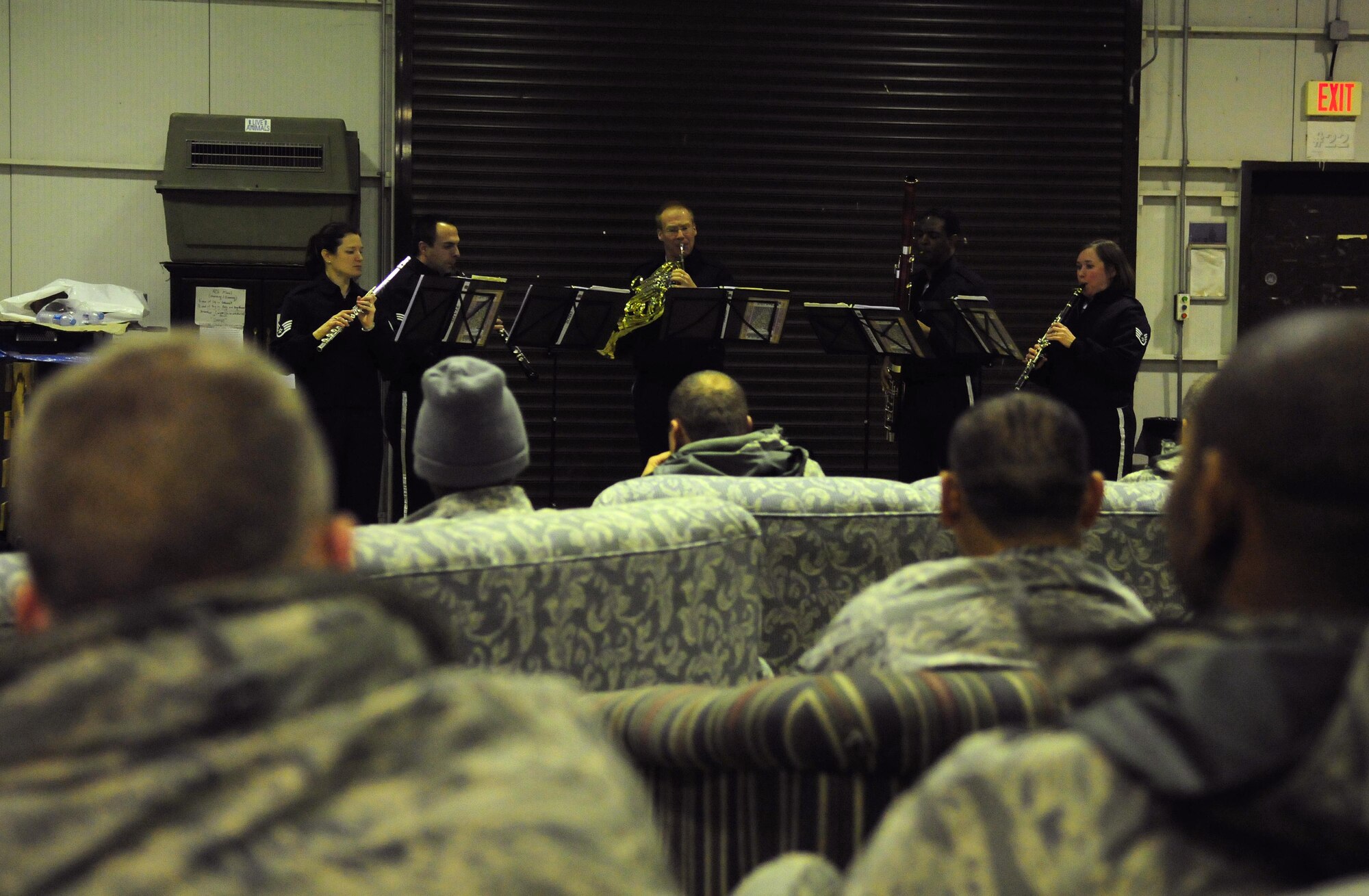 Winds Aloft Woodwind Quintet, a premier component of the USAFE Band, performs for deployed members of the 385th Air Expeditionary Group Dec. 16, 2010 at Incirlik Air Base, Turkey.  Winds Aloft, a five-member ensemble from the USAFE band, visited Incirlik to spread holiday cheer to Airmen and their families.  (U.S. Air Force photo by Senior Airman Ashley Wood/Released)