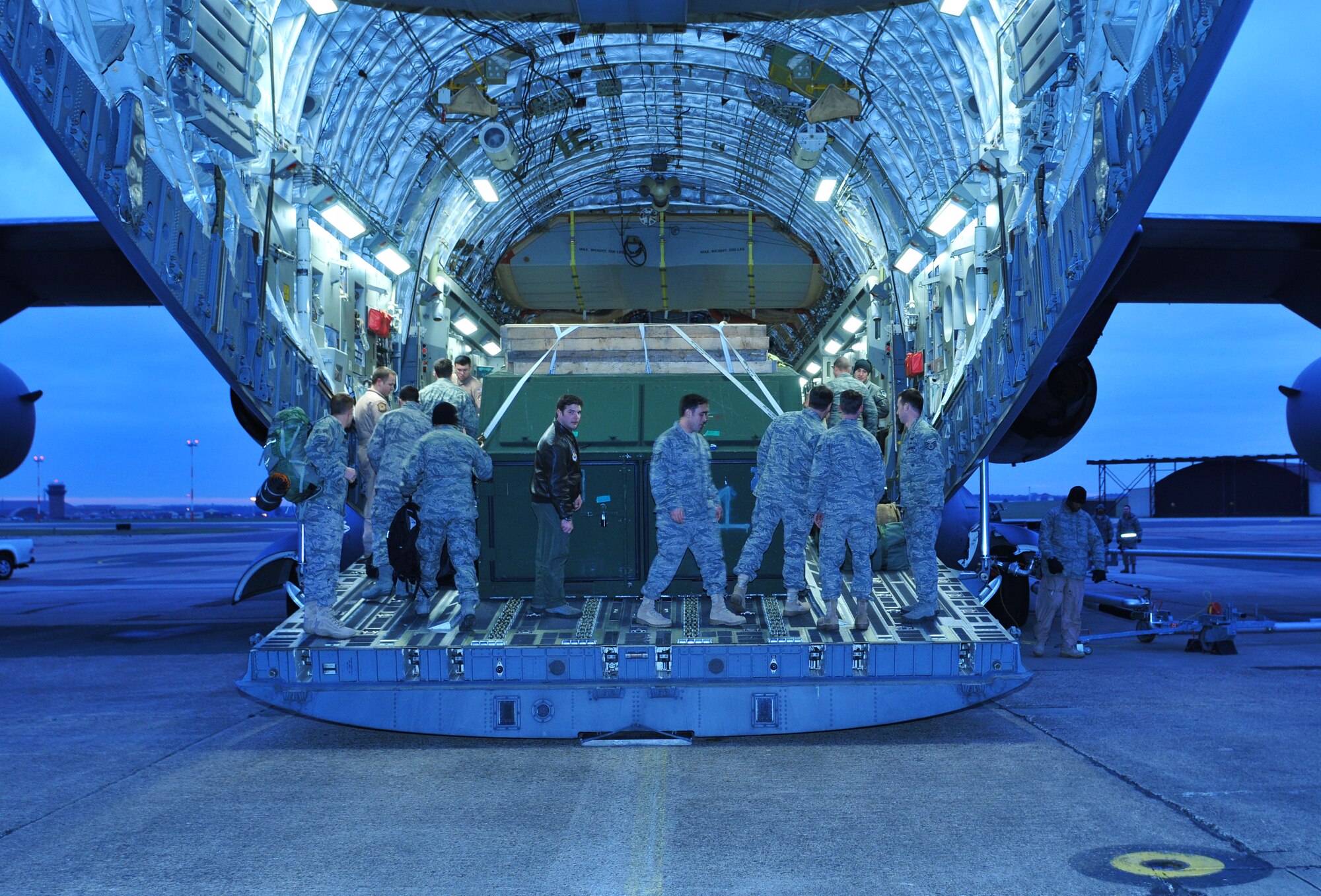 Pararescue Airmen from the 56th Rescue Squadron load a C-17 Globemaster for their deployment to Southwest Asia from RAF Lakenheath, England, Jan. 4. The team’s mission is to penetrate hostile areas to rescue and recover survivors.  They are certified scuba divers and skilled in surface water operations. They're also trained combat medics and certified emergency medical technician paramedics.  (U.S. Air Force photo by Staff Sgt. Connor Estes)