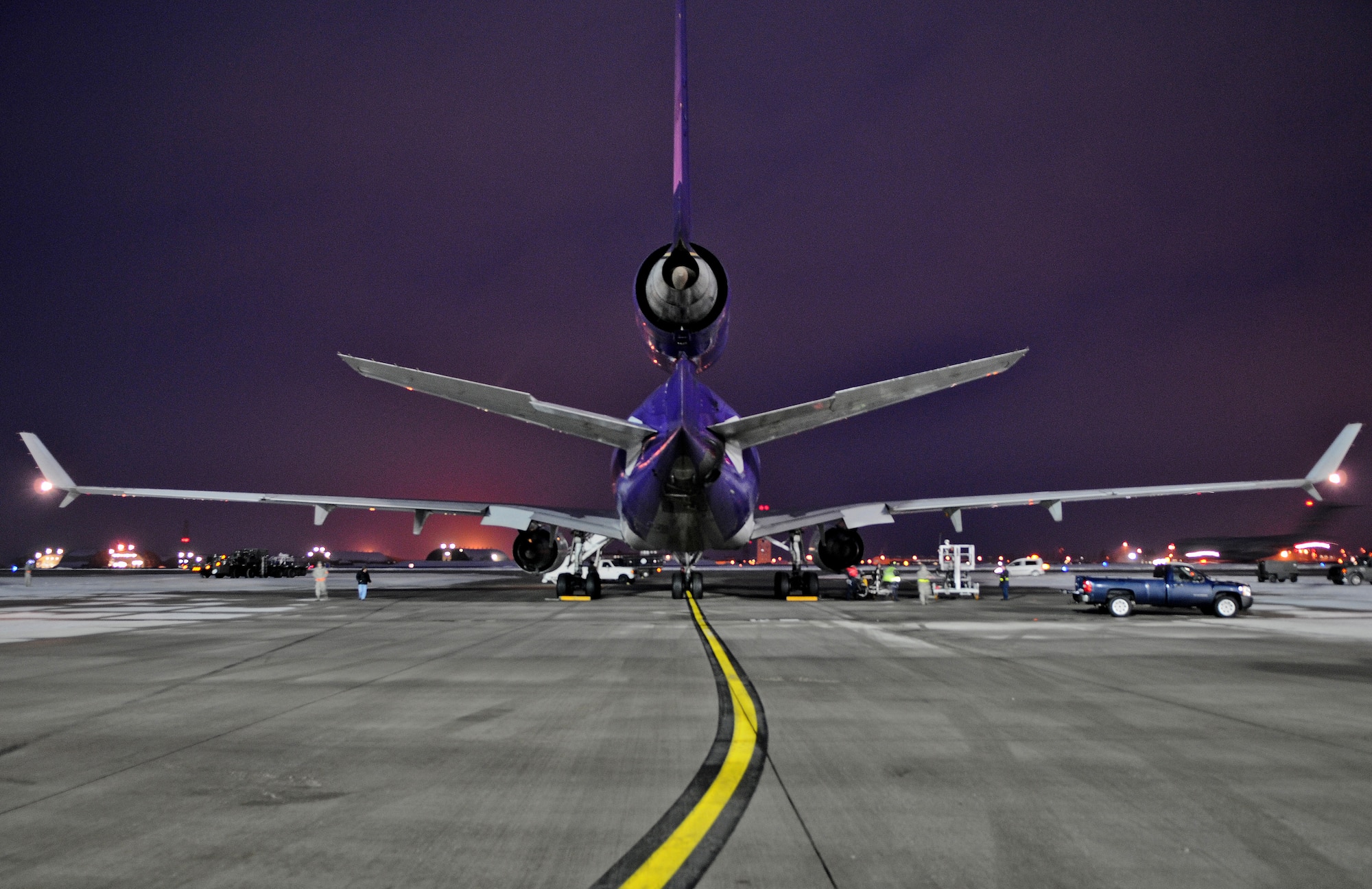 SPANGDAHLEM AIR BASE, Germany – A McDonnel Douglas MD-11F is loaded with cargo by members of the 52nd Logistics Readiness Squadron and 726th Air Mobility Squadron during a cargo upload process Jan. 5. The cargo was flown to Nellis Air Force Base, Nev., to support the 480th Fighter Squadron during a Red Flag training exercise. The 480th FS will be participating in Red Flag from Jan. 22 – Feb.  4. (U.S. Air Force photo/Senior Airman Nick Wilson)