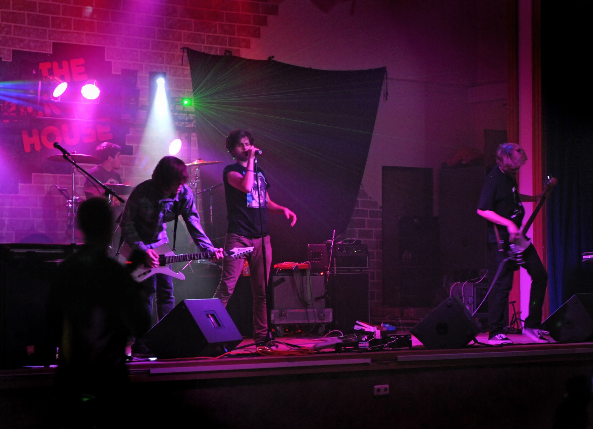 SPANGDAHLEM AIR BASE, Germany –Los Angeles band ACIDIC plays on stage during a free concert at the Brick House Jan. 3. ACIDIC performed across Europe during their Armed Forces Entertainment Tour to entertain American servicemembers. (U.S. Air Force photo/Airman 1st Class Matthew B. Fredericks)