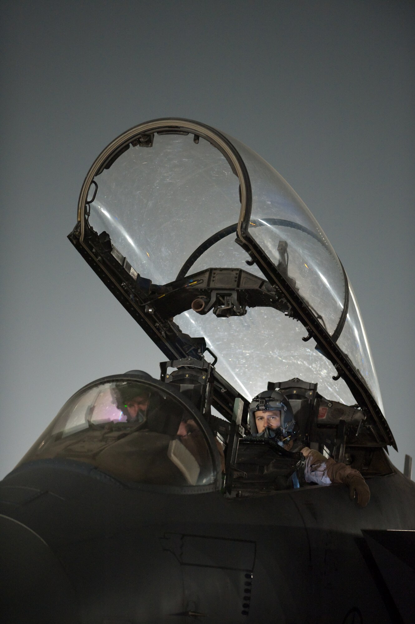 Left, Capt. Kellen Sick, and Maj. Aaron Ruona, both with the 336th Expeditionary Fighter Squadron, prepare their F-15E  to take off on a combat mission from Bagram Airfield, Afghanistan, Jan. 4, 2011. The 336th EFS preforms close air support missions within the local area and is deployed from Seymour Johnson Air Force Base, N.C. (U.S. Air Force by Staff Sgt. Robert Barney)