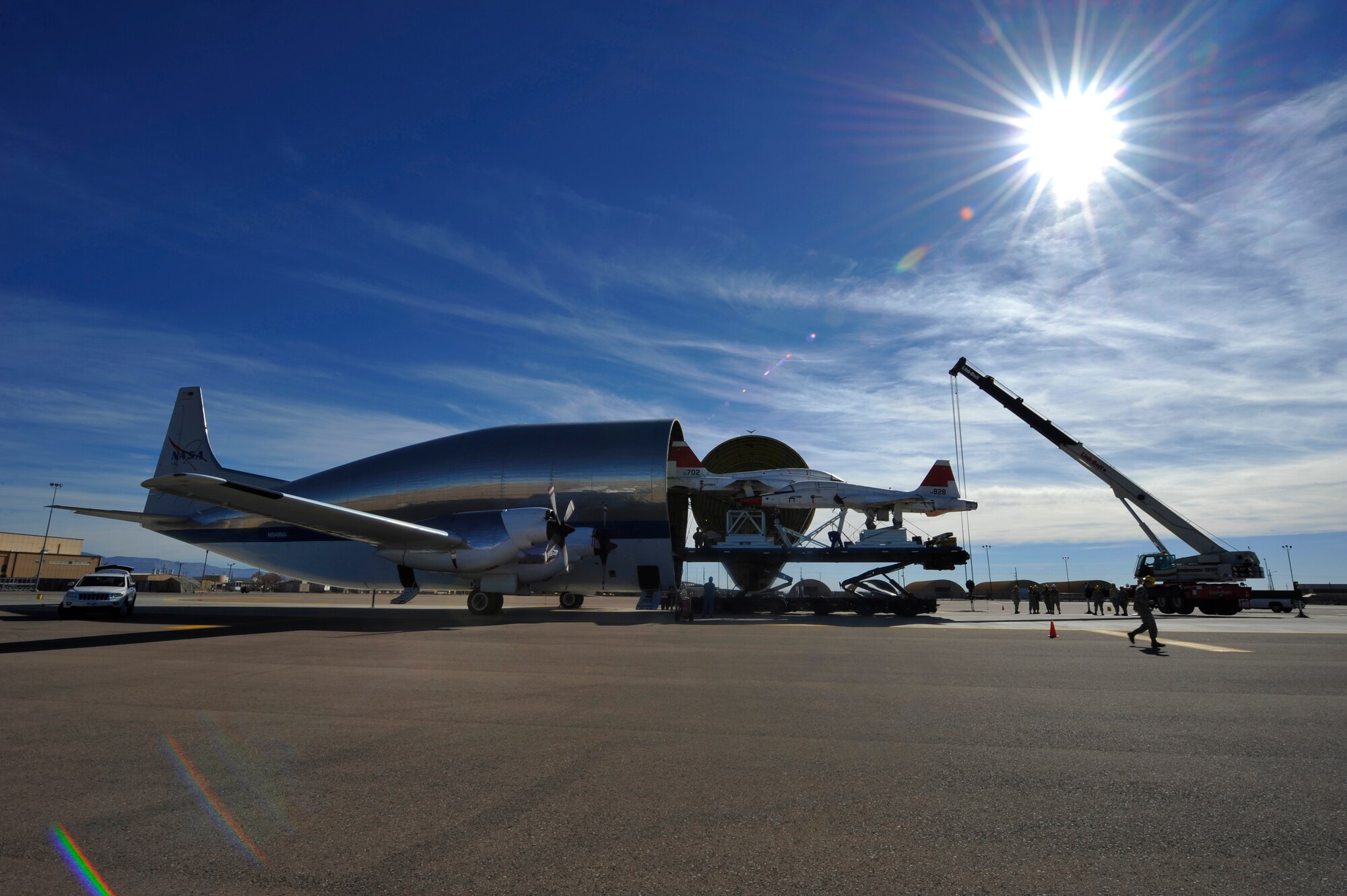 HOLLOMAN AIR FORCE BASE, N.M. -- Two T-38 Talons are unloaded out of a NASA Super Guppy aircraft by a cargo loader Dec. 14, 2010. The shipment is the first two T-38s of 15 to be shipped to Holloman and then inspected and regenerated before being flown to Joint Base Langley-Eustis, Va. M1 Support Services at Holloman maintain the T-38 Consolidated Aircraft Maintenance program here and is the main depot in Air Combat Command for repairing the T-38. After every 450 flight hours at their operating location, the T-38s will come back for an inspection. (U.S. Air Force photo by Senior Airman Veronica Stamps/Released)