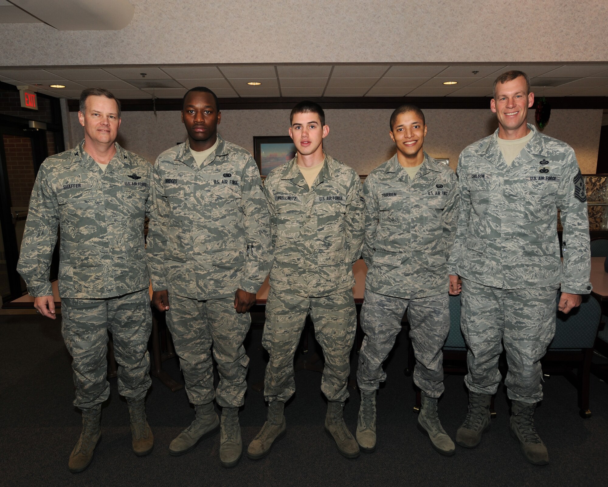 December’s Diamond Sharp Award recipients are (from left to right) Airman 1st Class Steven Bridges, 319th Logistics Readiness Squadron; Airman 1st Class Bryce Prellwitz, 319th Civil Engineering Squadron; and Airman 1st Class Bruno Farren, 319th Force Support Squadron. (U.S. Air Force photo by Staff Sgt. Suellyn Nuckolls)