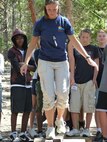 Emily Brucker, a member of the 567th RED HORSE Squadron, participates in a confidence course exercise during the 2010 Adventure Teen Leadership Summit. Brucker served as a adult volunteer for the AFRC/ANG sponsored event. Applications are being taken for the 2011 summits. (Courtesy photo)
