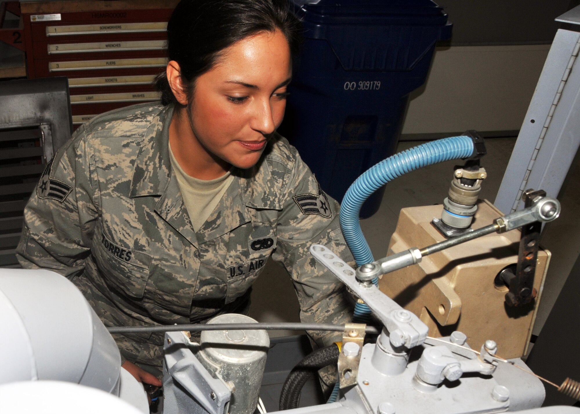 Senior Airman Magdalena Torres, a 914th Maintenance Squadron Aerospace Ground Equipment apparentness, explains the purpose on an aircraft power unit January 6, 2011, Niagara Falls Air Reserve Station, Niagara Falls, NY. Senior Airman Torres was selected to attend the "Leaders Encouraging Airman Development Diversity Visitation Program" at the Air Force Academy in Colorado Springs, Colorado. (U.S. Air Force photo by Staff Sgt. Joseph McKee)