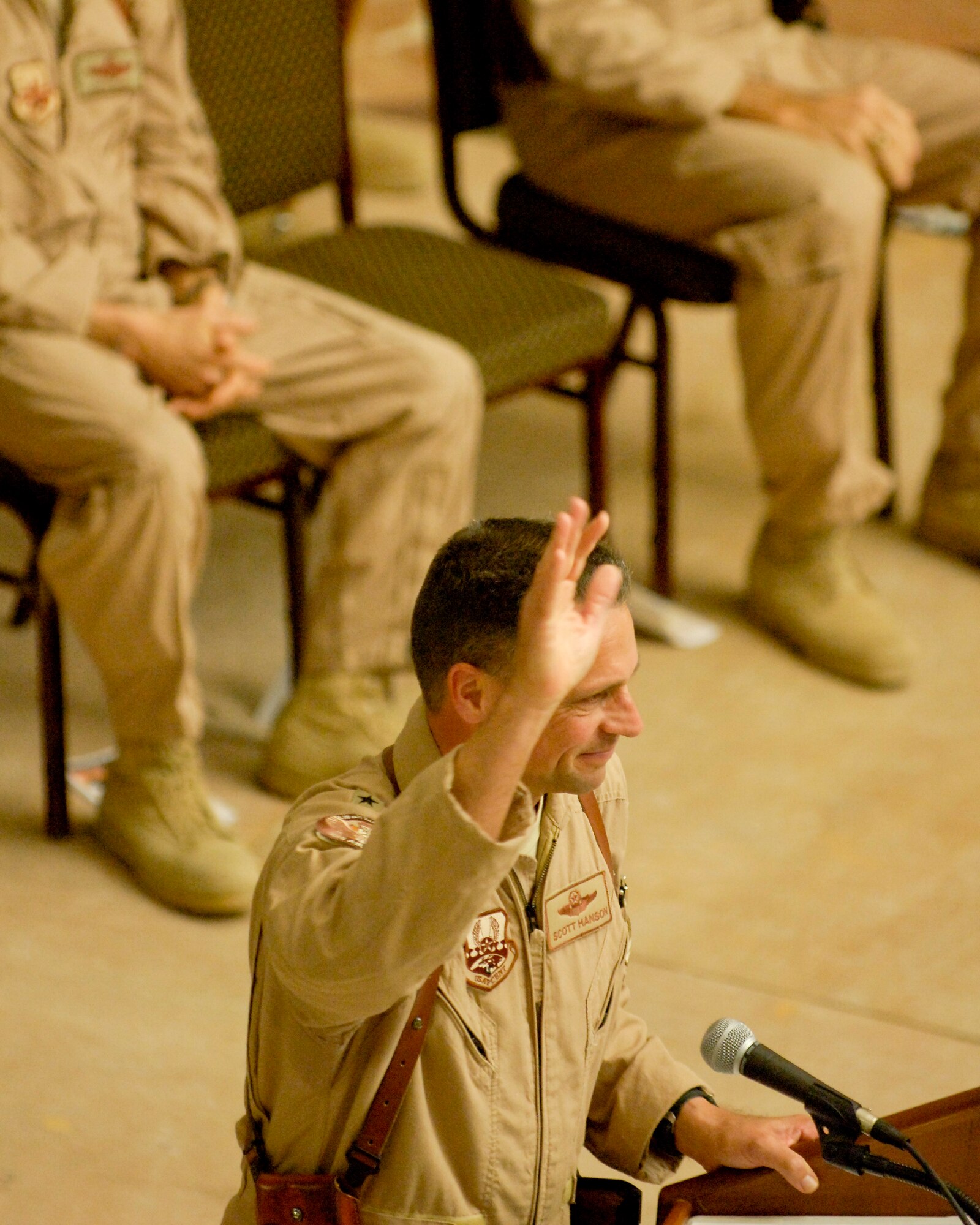 Brig. Gen. Scott Hanson waves farewell before relinquishing command of the 321st Air Expeditionary Wing and Iraq Training and Advisory Mission - Air Force during a change of command ceremony at Al Faw Palace in Victory Base Complex, Baghdad, Jan. 6. (U.S. Air Force/Tech. Sgt. Jason Lake)