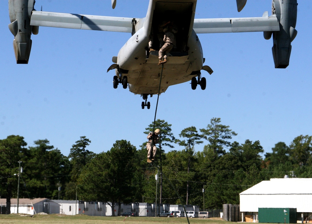 Marines from Expeditionary Operations Branch, Special Operations Training Group, participate in helicopter rope suspension training aboard Marine Corps Base Camp Lejeune, N.C., Oct. 7, 2010. The day’s training focused on the practical application of fast rope training from the MV-22 Osprey.